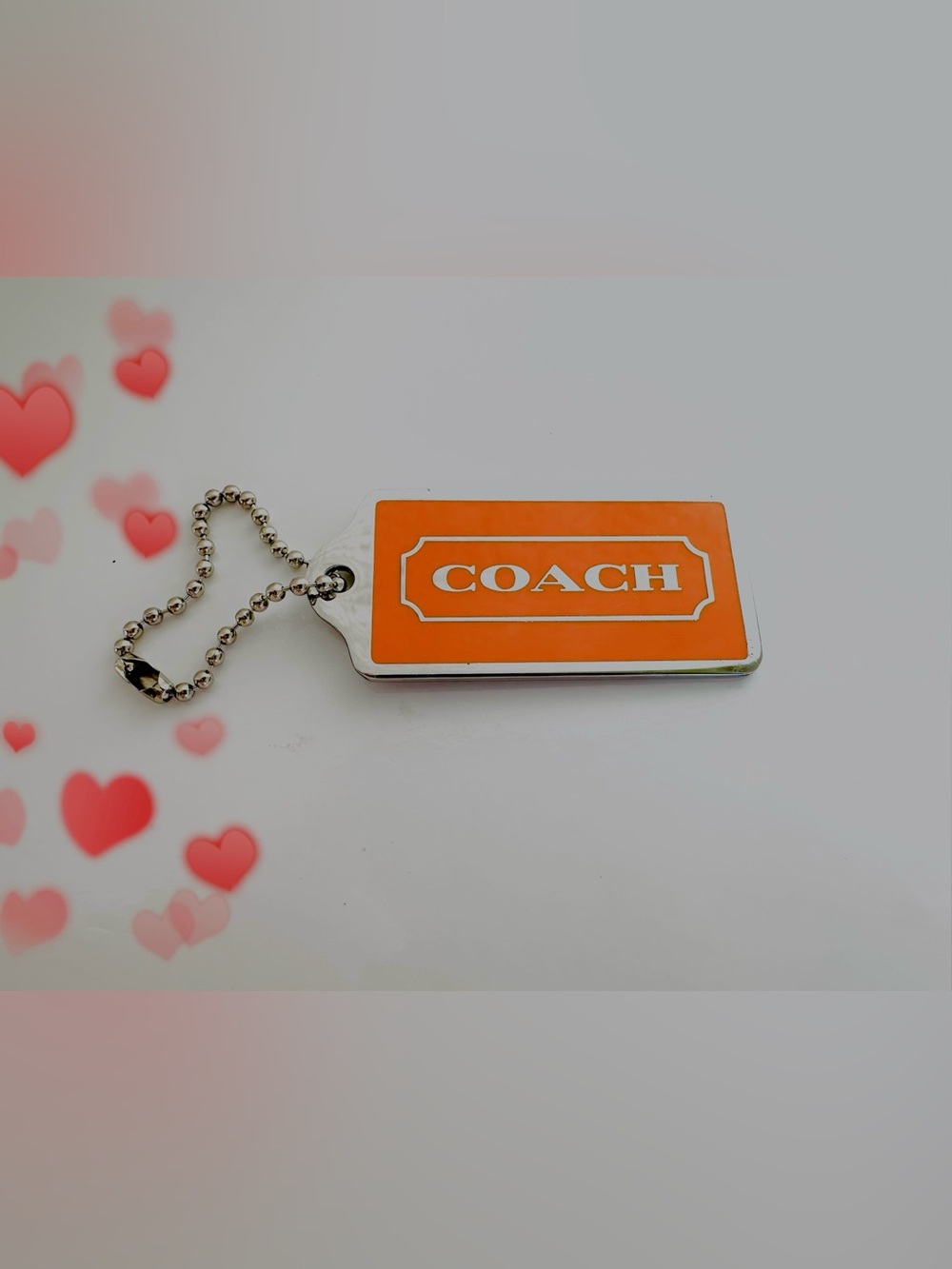 Coach Orange Enamel Dog Tag Keychain